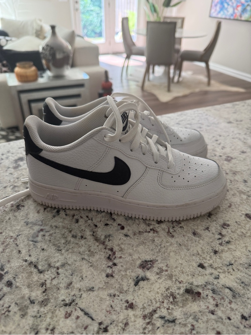 Nike Kids White Sneakers with Black Swoosh